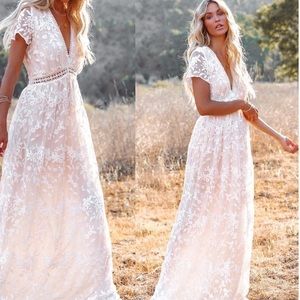 VICI dress size Small but fits more like a medium. Beautiful dress!